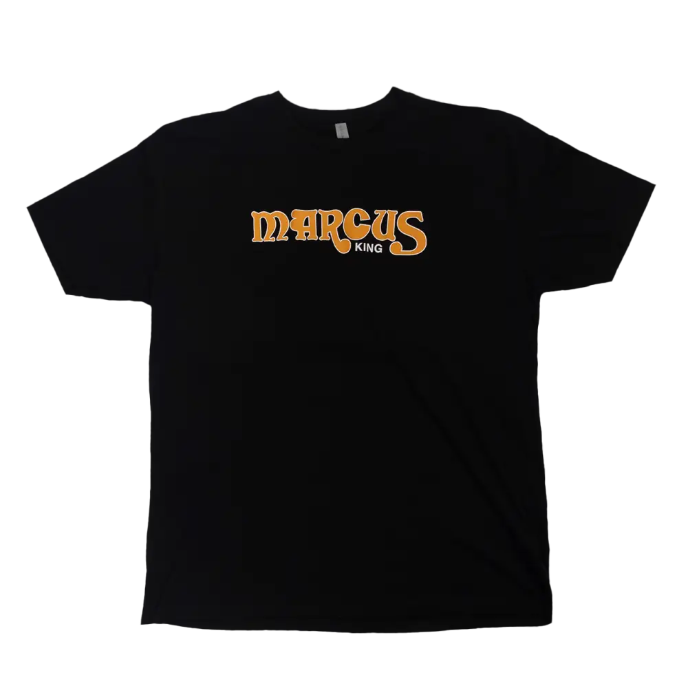 Black t-shirt with ’MARCUS’ printed in orange and yellow lettering on the front.