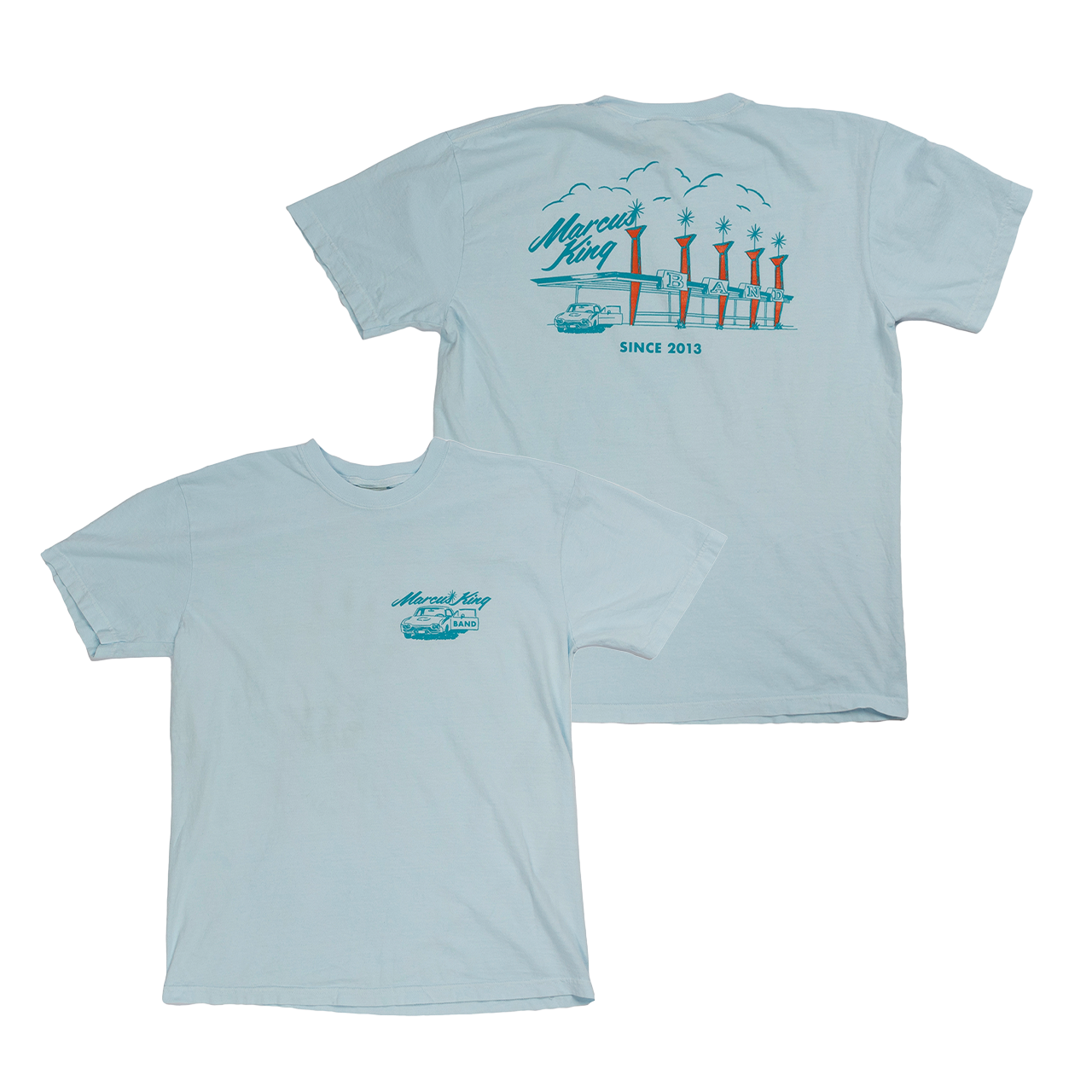 Light blue t-shirt with a coastal-themed graphic design on the front and back.