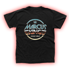 Black t-shirt featuring a retro-style circular logo with ’Marcus King’ text and a crown symbol.