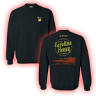 Black sweatshirt with ’Carolina Honey’ design on the back and a small logo on the front.