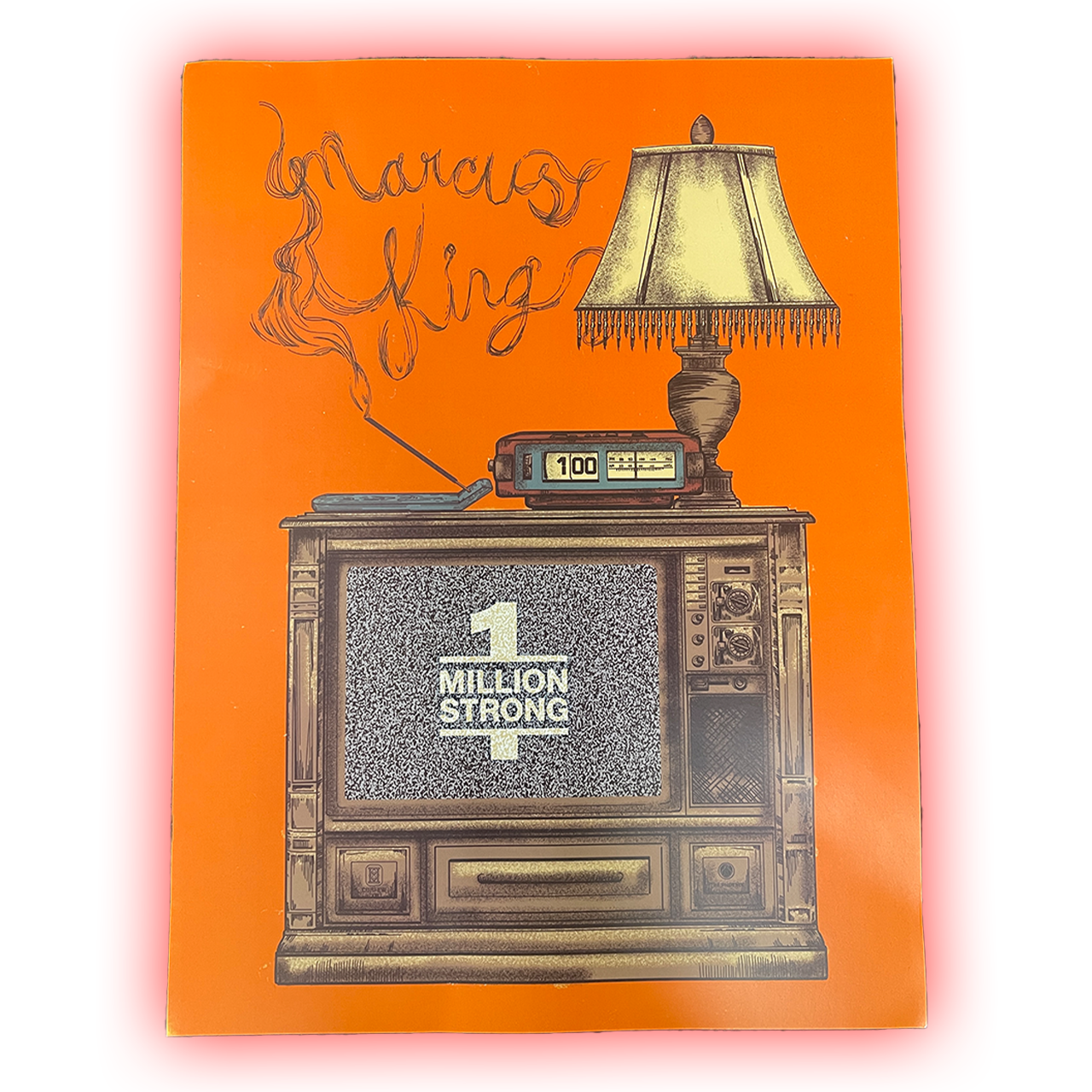 Vintage television set displaying ’MILTON STRONG’ on its screen, with a lamp on top and smoke spelling out ’Graveyard King’.