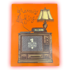 Vintage television set displaying ’MILTON STRONG’ on its screen, with a lamp on top and smoke spelling out ’Graveyard King’.