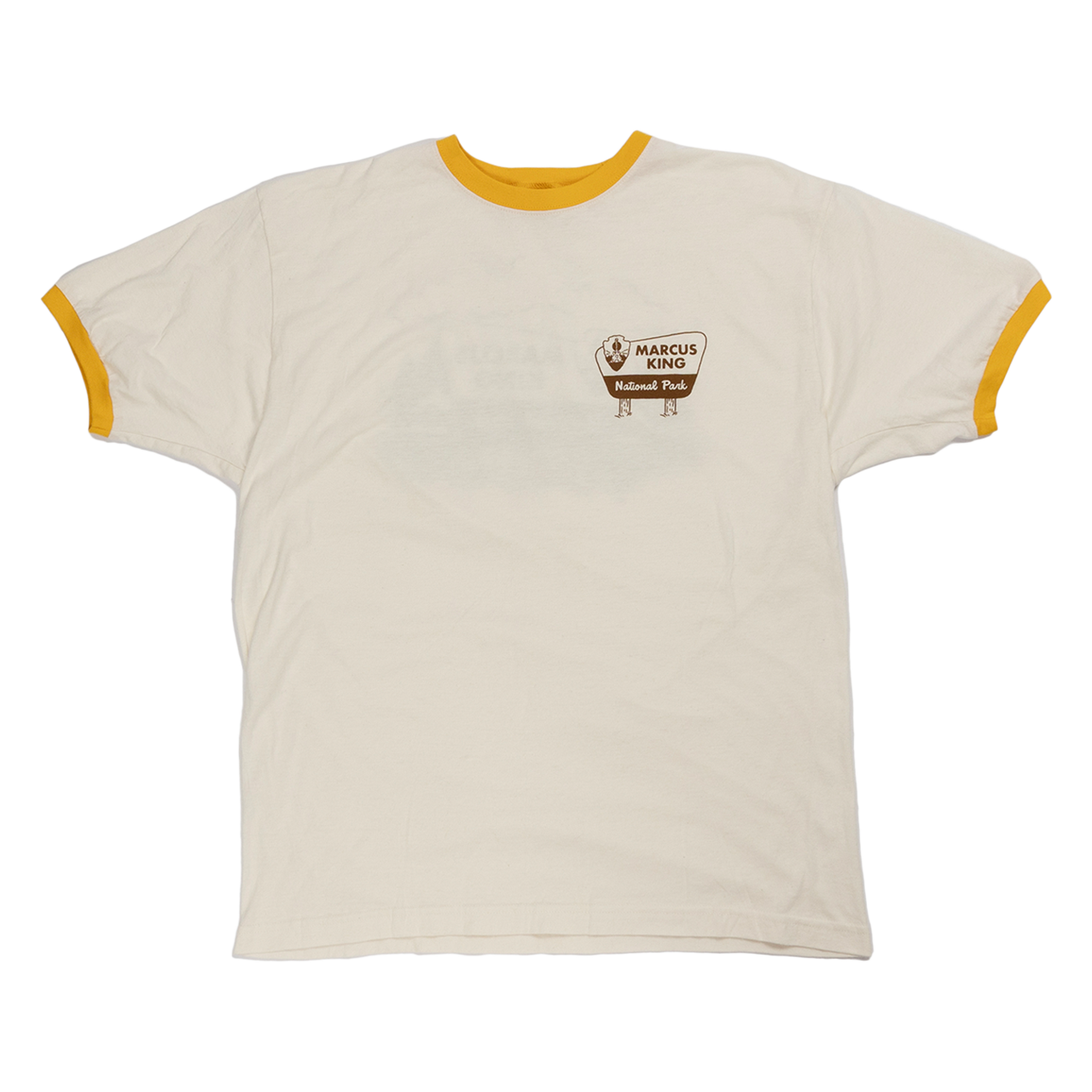 White t-shirt with yellow trim and a small logo on the chest.