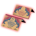 Rolling papers branded as ’Purely King’ with decorative blue flourishes on a tan background.