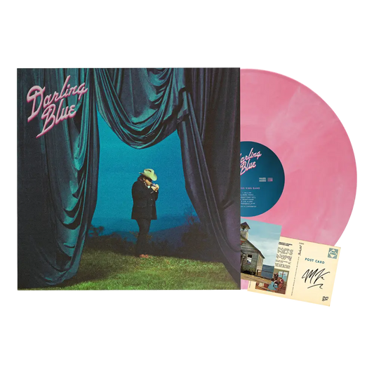Pink translucent vinyl record with a blue center label featuring the album title ’darling blue’ by the cursive band.