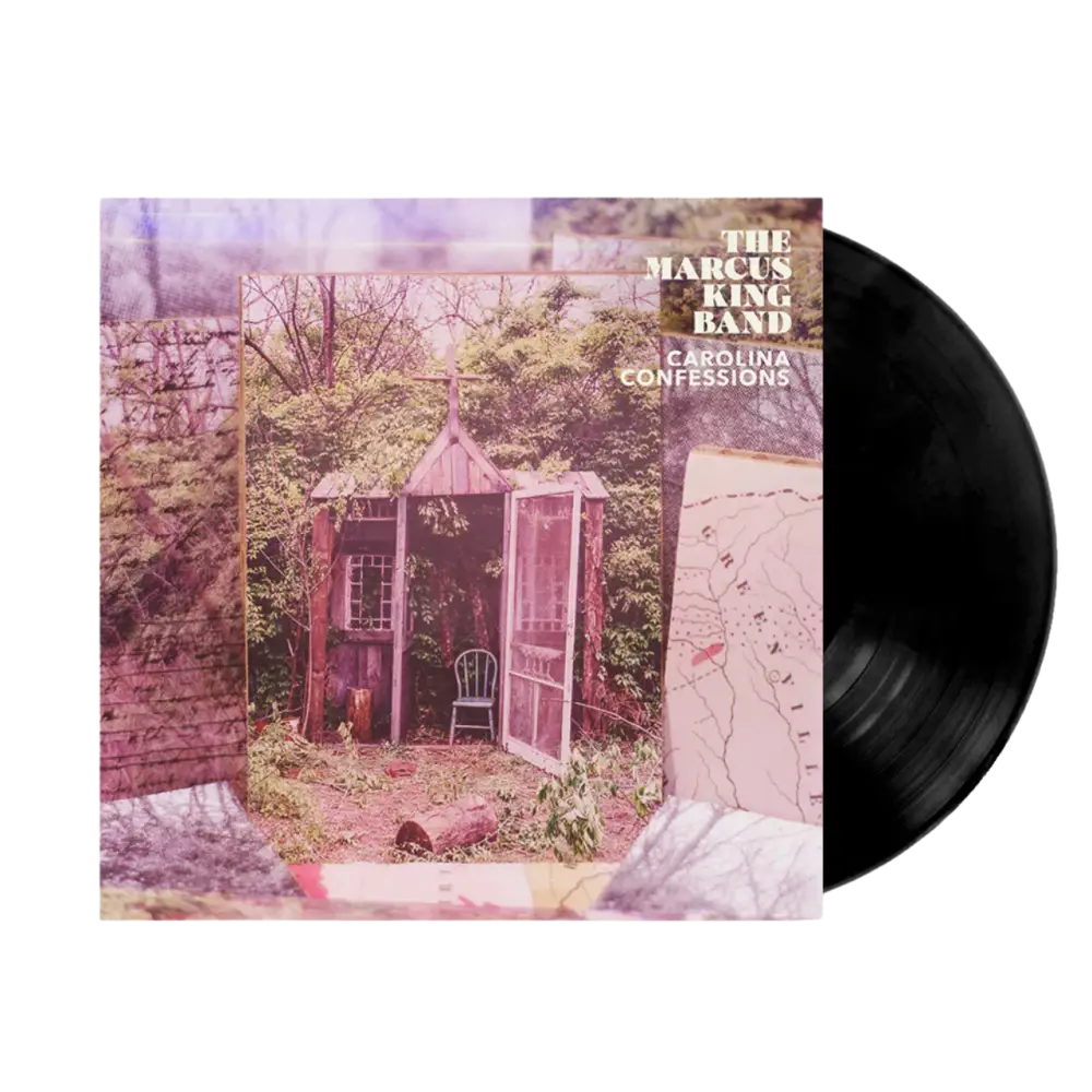 Vinyl record with a cover featuring a small cabin in the woods and 'The Marcus King Band Carolina Confessions' text.