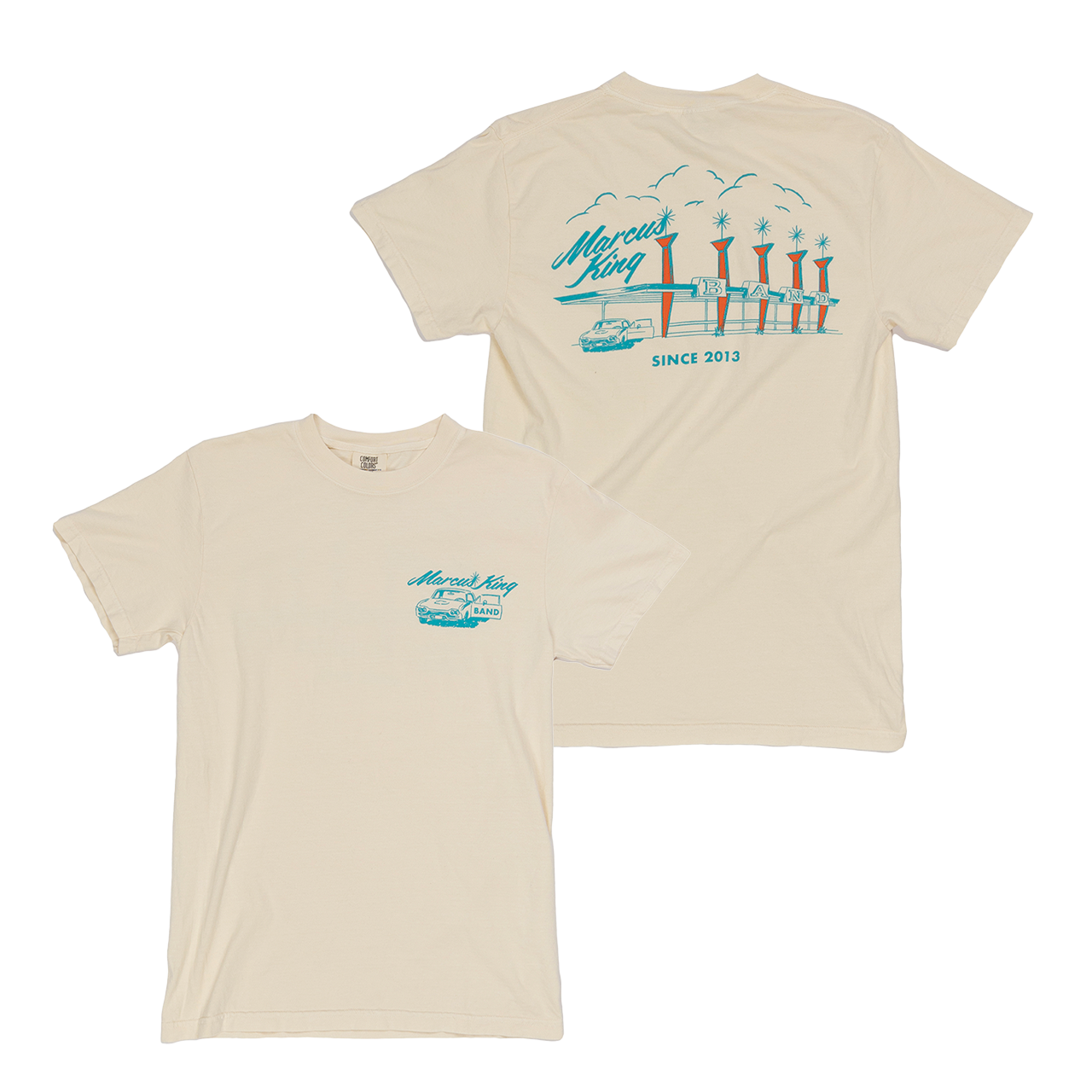 Beige t-shirt with a teal coastal design featuring piers or docks printed on the back.