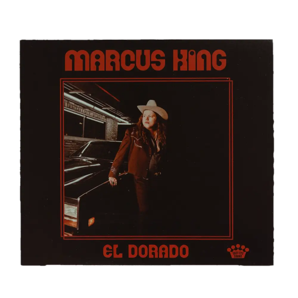 Album cover featuring a person in a cowboy hat and red suit standing next to a car.