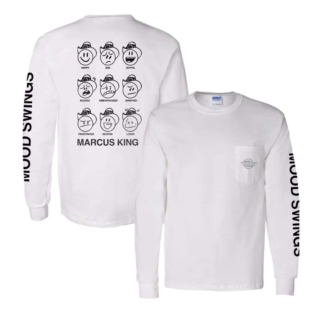 White long-sleeved t-shirt with cartoon face designs and text printed on it.