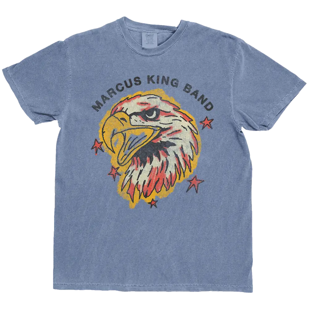 Blue t-shirt with an eagle graphic and 'Marcus King Band' text on a white background
