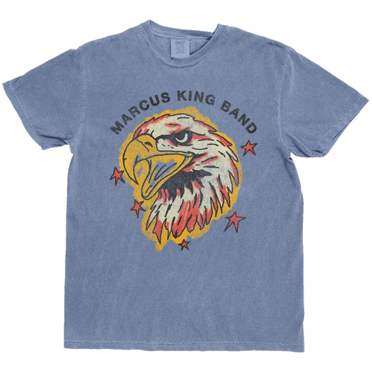 Blue t-shirt with an eagle graphic and 'Marcus King Band' text on a white background