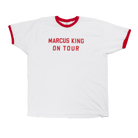 White t-shirt with red trim and ’MARCUS KING ON TOUR’ printed in red letters.