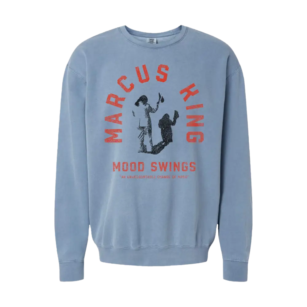 Light blue sweatshirt with ’Marcus King Mood Swings’ text and a silhouette graphic design on the front.